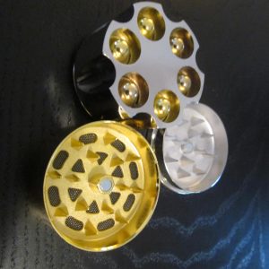 Revolver style marijuana smoking grinder