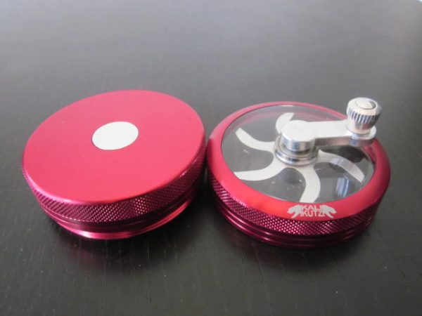 best red marijuana smoking grinder