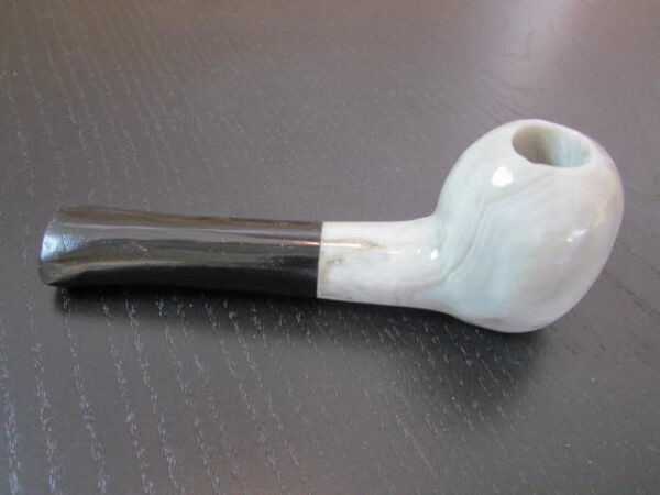 gray and black large onyx stone pipe