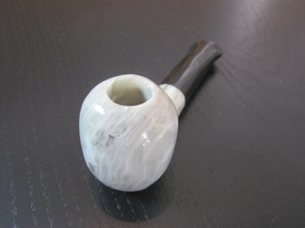 gray and black large onyx stone smoking pipe