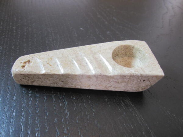 mid size brown stone pipe