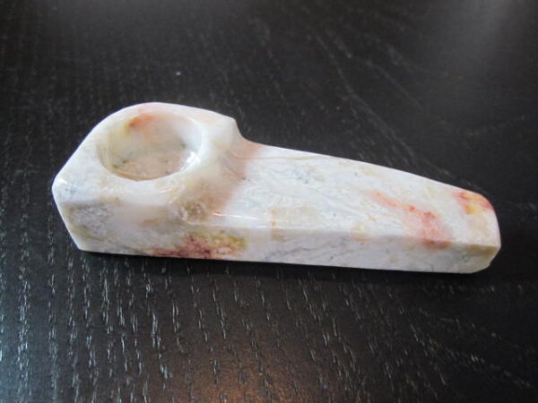 mid size red color stone pipe