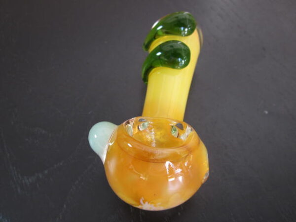 yellow green glass smoking pipe